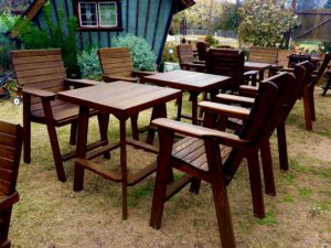 Quality Patio Furniture group of Tall Square Bistro Tables with Tall Deck Chairs on grass