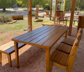 Quality Patio Furniture 6 ft. Outdoor Dining Table - Roarke Style with 3 Curved Seat Dining Chairs on one side of the table and one 6 ft. Courtside Bench Handcrafted by Jack Hudson (830) 367-3848 6 ft. Outdoor Dining Table - Roarke Style with 3 Curved Seat Dining Chairs on one side of the table and one 6 ft. Courtside Bench Quality Patio Furniture Handcrafted by Jack Hudson (830) 367-3848