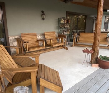 Quality Patio Furniture A collection of Texas Hill Country furniture arranged to enjoy the view. Handcrafted by Jack Hudson (830) 367-3848 Adirondack Chair with Footstool, Wide Side by Side Glider and 6 ft. Glider arranged nicely on a Hill County patio. Quality Patio Furniture Handcrafted by Jack Hudson (830) 367-3848
